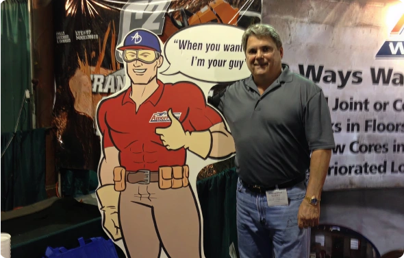 Ameri-dry employee with company mascot cutout